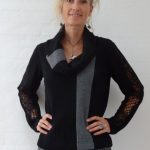 Lækker uld strik bluse med blonde