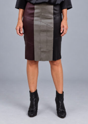 Skindnederdel med stretch i tre farver, set tæt på forfra