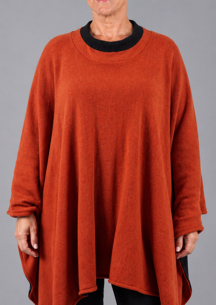 Vendbar uldponcho i orange/sort