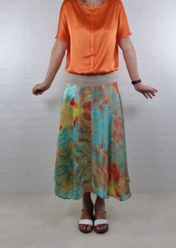 Silke nederdel i tyrkis orange