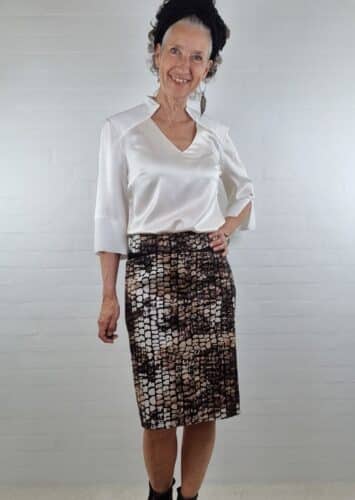 Nederdel i brunlige farver med lommer