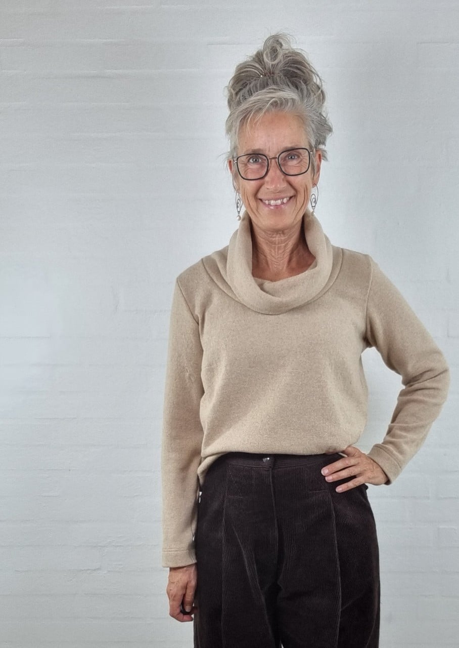 Cremefarvet Uldstrik med rullekrave