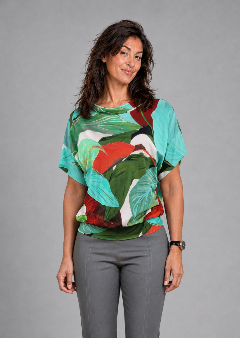 Tyrkisgrøn rød jersey bluse m bladprint, set forfra
