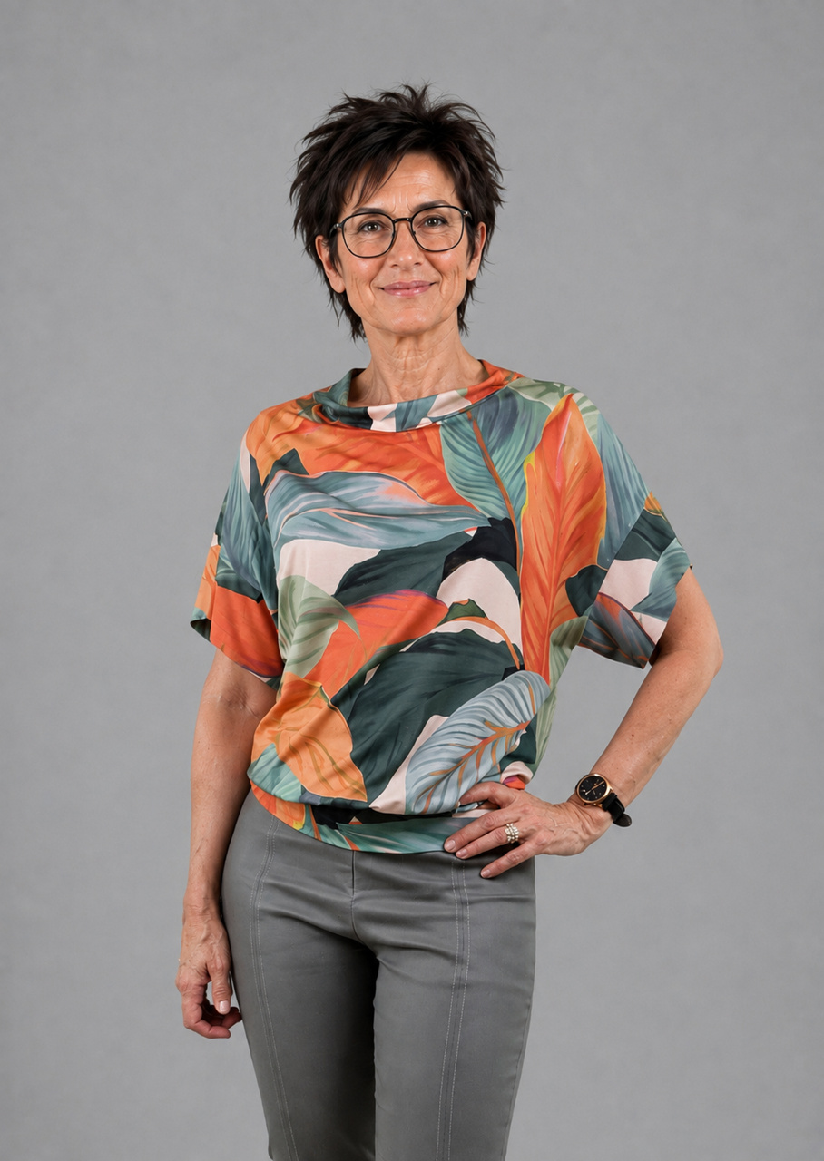 Orange grøn jersey bluse med bladprint, set forfra