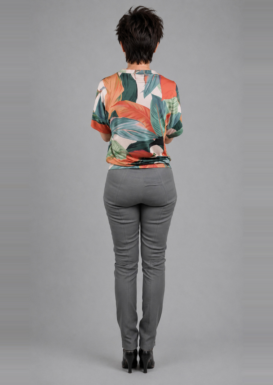 Orange grøn jersey bluse med bladprint, set bagfra