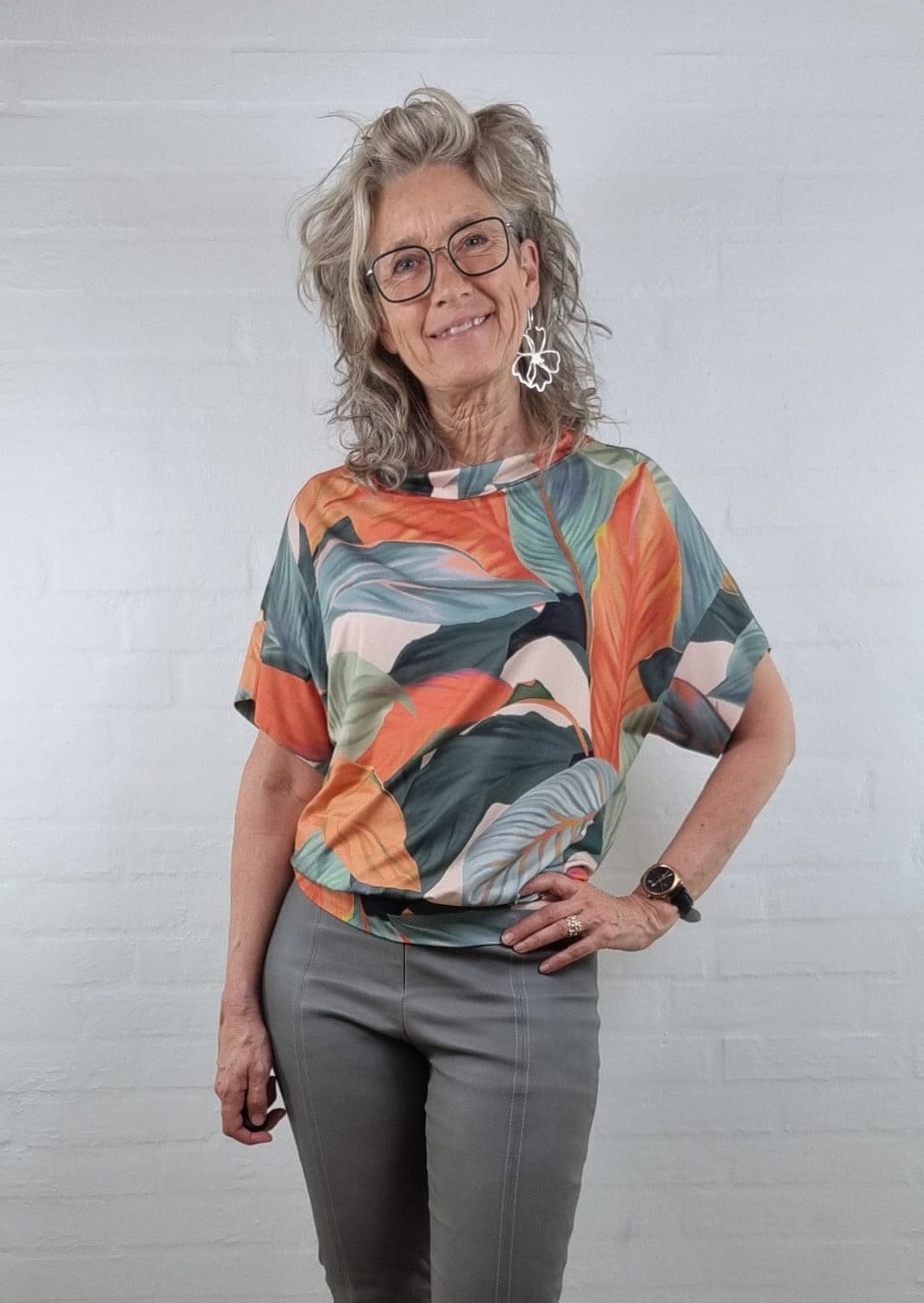 Orange grøn jersey bluse med bladprint