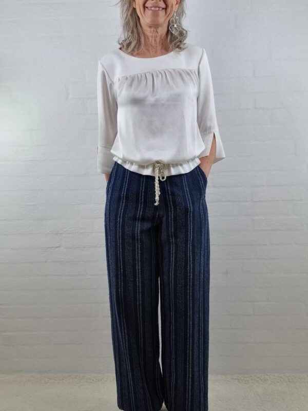 Højtaljede bukser med vidde i denim